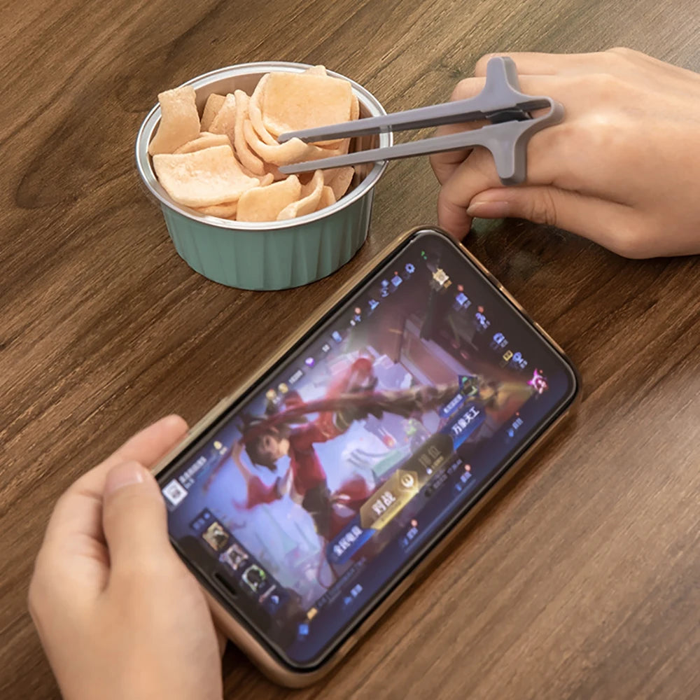 Finger Snack Chopsticks – No Mess Gaming & Reading Tool