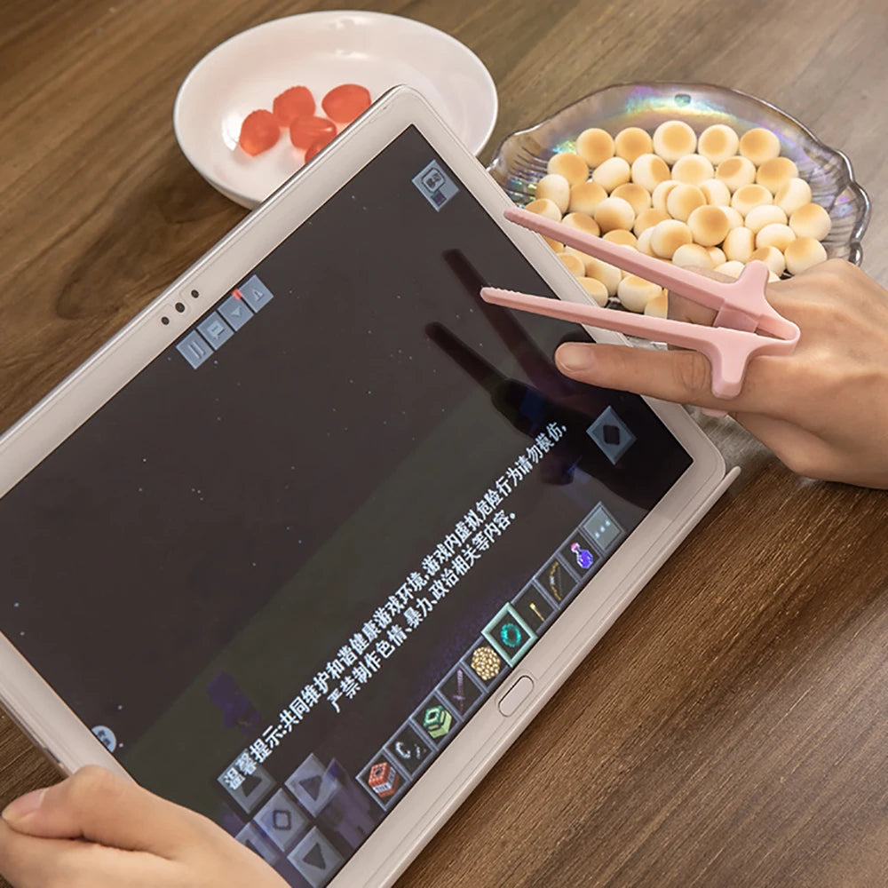 Finger Snack Chopsticks – No Mess Gaming & Reading Tool