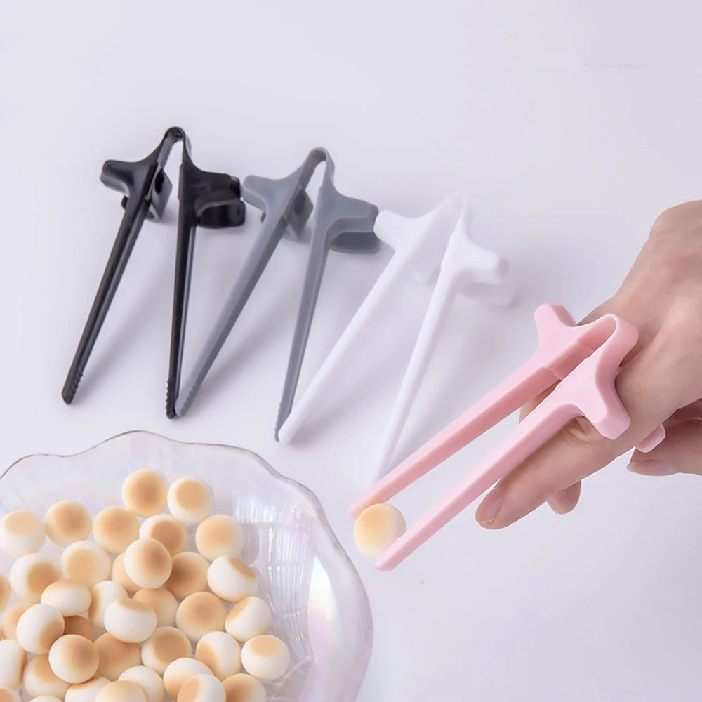 Finger Snack Chopsticks – No Mess Gaming & Reading Tool